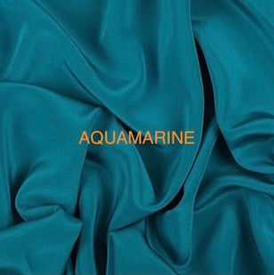 HELENNE DRESS (Clay, Crocus, Aquamarine, Persimmon,  Delft Blue,  Chartreuse, and Black) shown in PLUM)