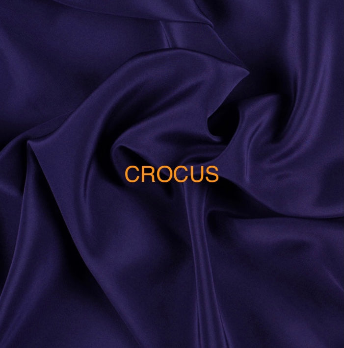 HELENNE DRESS (Clay, Crocus, Aquamarine, Persimmon,  Delft Blue,  Chartreuse, and Black) shown in PLUM)